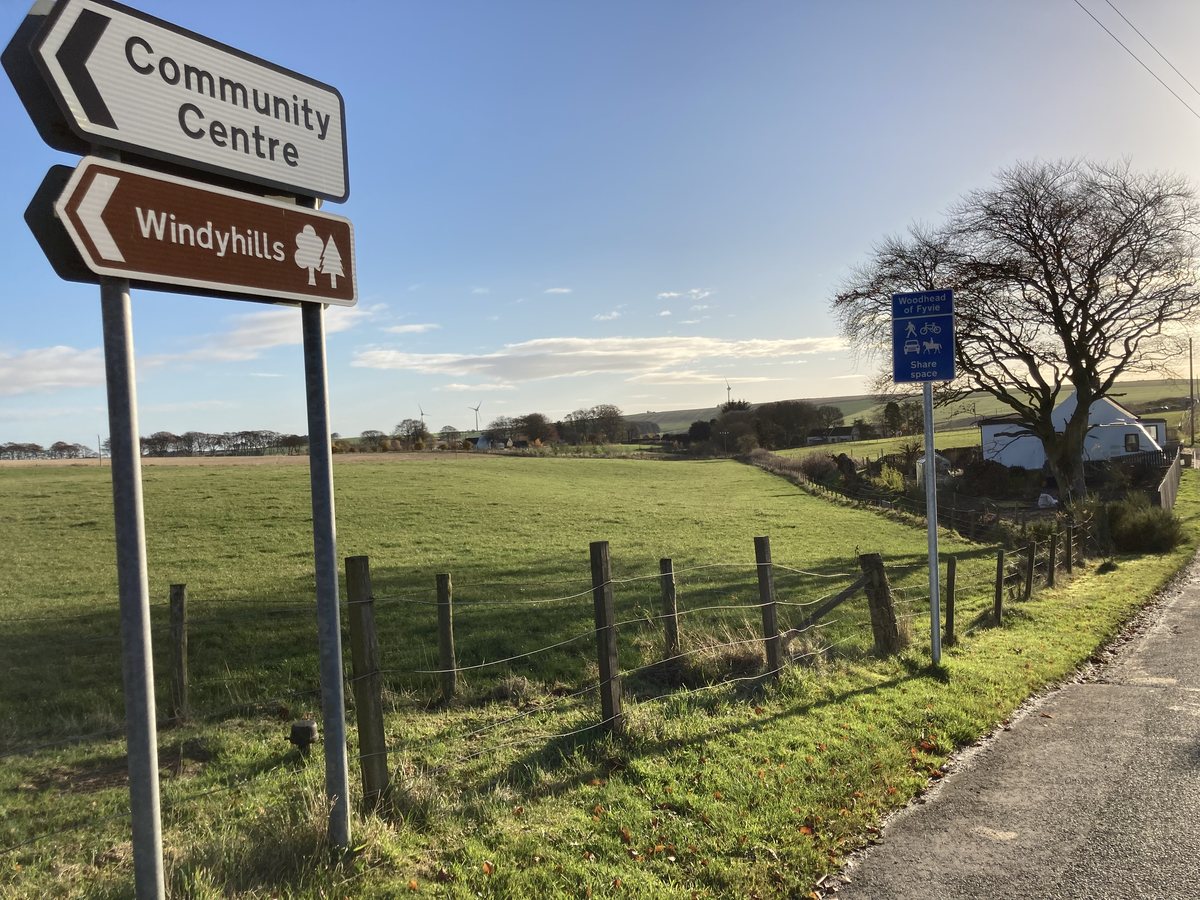 Roadside signs to Windyhills and the Community Centre